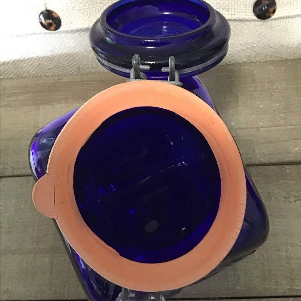 Vintage Farm Products Cobalt Blue tilt head canister w/metal closure.made ltaly